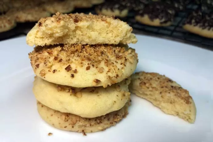 Amish Sugar Cookies rolled in toasted almonds before baking